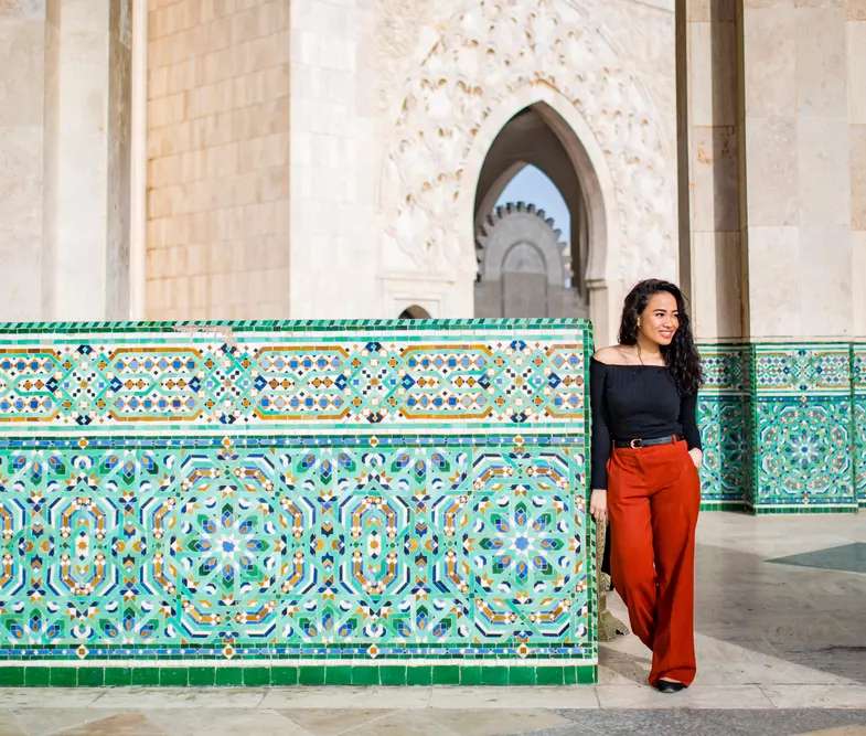 Morocco Vacation Package A girl is taking a photo in Morocco
