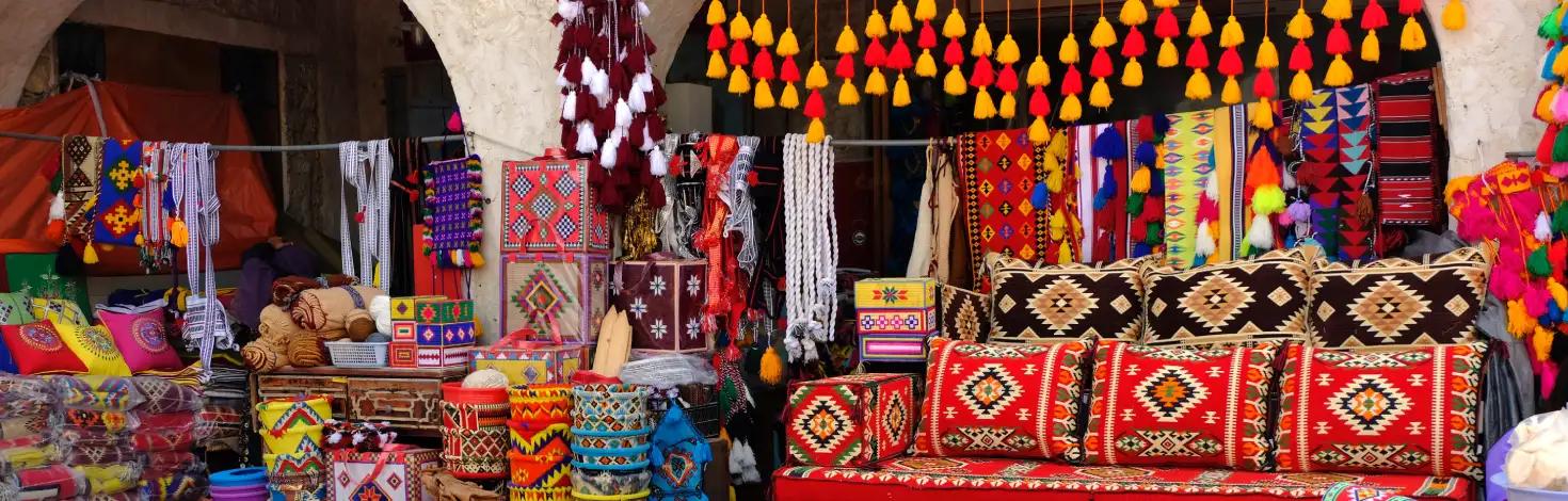 Traditional oriental carpets and pillows at Souq Waqif, Doha, Qatar. Traditional oriental carpets and pillows at Souq Waqif, Doha, Qatar.